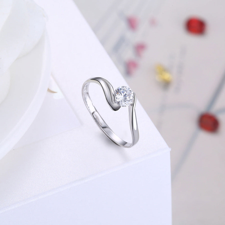 Aurore | Bague solitaire à cristal serti torsadé